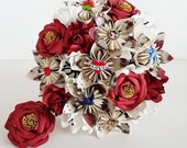 Alternative bouquet wedding flowers paper origami vintage rockabilly red gold sailor jerryanchor rose swallow tattoo theme bride dress sash